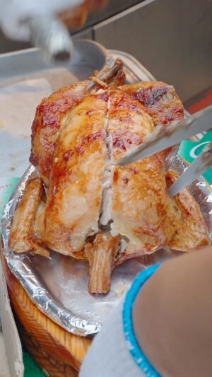 Mark Wiens Instagram - Tried this chicken stuffed with glutinous rice and ginseng, rotisserie roasted over fire! 🔥 With kimchi it was amazing! #Seoul #KoreanFood