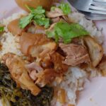 Mark Wiens Instagram - Insanely tender, melt in your mouth stewed pork leg! 📍 Nai Uu Pork Leg Stew (ขาหมูนายอุ๊ พลับพลาไชย) #Bangkok #streetfood #ThaiFood ข้าวขาหมูนายอุ๊