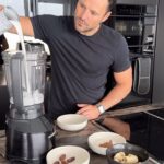 Mark Wright Instagram - Cacao, coconut & date protein smoothie aka “chocolate milkshake” 🥥🍫 If you’re trying to incorporate more protein in your diet but don’t love the taste of protein powder, this is for you! Makes a great quick, on the go breakfast too. For anyone looking to improve their diet or fitness and is looking for structure and support to do this then check out our coaching page @_livewright_, we are building a community of people who are absolutely smashing it and we’d love for you to smash it too! Ingredients (makes 2 glasses): 2 frozen bananas 4 dates 1 can of light coconut milk 3 dessert spoons of cacao powder 2 scoops of protein (I used vanilla) 2 handfuls of ice