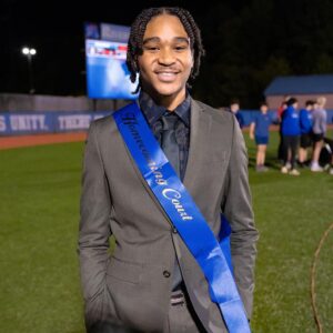 Marlo Hampton Instagram - On Friday night, William and I escorted Michael on the field, he represented the Junior Class in Homecoming Court 2023!! 💙😊 I’m so proud of him and full of Joy! 

This joy that I have 
World didn't give it, and the world 
Can't take it away, 
I got it, I got it 
In my walk, 
In my talk, 
In my home,