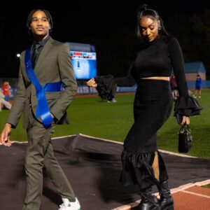 Marlo Hampton Instagram - On Friday night, William and I escorted Michael on the field, he represented the Junior Class in Homecoming Court 2023!! 💙😊 I’m so proud of him and full of Joy! 

This joy that I have 
World didn't give it, and the world 
Can't take it away, 
I got it, I got it 
In my walk, 
In my talk, 
In my home,