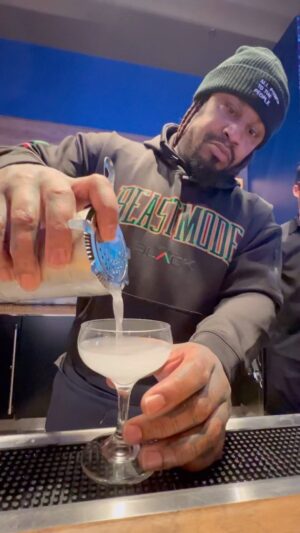 Marshawn Lynch Instagram - that one time Marshawn Lynch was the bartender at #TostbyTostitos #SBLVIII