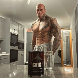 Martyn Ford Instagram - The best thing you can do is to lose that excess, which is holding you back.  Trim away all of the fat, the extra baggage, the lose weight.  If it’s not helping push you forwards, it’s dragging you backwards … evolve into the best version of yourself.  Start today, because tomorrow will be to late. 

@animalpak CUTS have been a staple in my new routine, I’m NOT saying these are the reason for my physical change, I’ve changed up my training and nutrition alongside my mind set.  But they have definitely helped add that extra spice in the mix.  What does 2024 have in stall for you? What are your goals, dreams and ambitions … refuse to stand still, make YOUR MOVE #animalpak #health #fitness #life #mindset