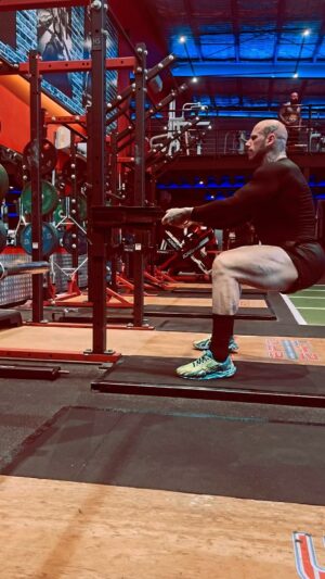Martyn Ford Instagram - There’s plenty of ways to skin a chicken …. Working on my drumsticks 😂 …. The goal, to build strength, stability and power … this is an incredible warm up exercise to get the muscles working … I like to run 4-5 sets of these before I go into plyometric work … sports specific, with goal specific … 

40 hours of travel, from U.K. to Aus, landed at 1 am, no sleep, and in the gym first thing … some will say crazy, some will say stupid, some will say pointless … I say, NO EXCUSES.  #mindset #hunger #focus