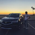 Matthew Lewis Instagram - At the third stroke, the time sponsored by @acura will be: DRIVETIME! Niche British gags aside, I’m thrilled to have partnered with @acura and to be driving their new MDX. Crazy tech on this vehicle and plenty of room for the dogs. It makes me appreciate life so much that I drive out to watch the sunset and look wistfully over my shoulder. I was caught doing just that here in this completely candid and not at all posed photograph. #AcuraPartner