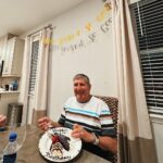 Matthew Lewis Instagram - What an end to 2022. The Lewis family visits 🇺🇸 for my Dad’s 80th birthday. Enormous thank you to @experiencekissimmee for hosting us at @encoreresort in Reunion. From a private dining experience to a cinema room for the World Cup. From the swimming pool to the golf course. It was a perfect trip that had it all. Here’s to 80 more years!