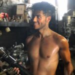Mena Massoud Instagram - It’s not Friday but here’s a flashback. @lilly advised me to do this. P.s. I have no idea what I’m holding, I think it’s a motorcycle part. 📷: the legendary @alexilubomirski
