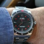Michael Blakey Instagram - Timepiece Thursday ! Check out this very unique creation from @artisansdegeneve A Rolex Milgauss belonging to one of their clients was completely reinvented featuring a waffle dial and red lume. Your imagination can be turned into reality … ~~~~~~~~~~ In it to win it ! ~~~~~~~~~~ Personalized by Artisans de Genève, which is not affiliated or authorized by ROLEX SA. A customization option available solely for private individuals who own a Rolex and only for their private use.