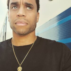 Michael Ealy Instagram - In my next role I play a doctor who saves lives. In reality, I never even went to med school but I do the best I can to help. On this #GivingTuesday I want give love to those who are actually saving lives everyday here in Los Angeles. @stannestoday today is a social service agency and a safe place for young women age 13-24 in one of LAs most vulnerable communities. From providing housing to those that are chronically homeless to early childhood education for the littles, the work being done at St. ANNES is indeed special to my heart (hence the medallion!) My better half @lifeandbread works closely with the organization to help better the lives of young mothers at @stannestoday. With her program #BreakBread she, Chef Courtney, and Jen Prakash have worked tirelessly to teach young mothers how to make healthy food options  for their families that are affordable and sustainable. @stannestoday personifies giving back. They do the work day in and day out. Their commitment to those in need is unparalleled and deeply personal. Times are tough for us all but if you have something to give today then let's #AllRise. Again if you can pls purchase this beautiful medallion from @foundrae at @brokenenglishjewelry to support the much needed work being done by St Annes. 💯 percent of the proceeds goes directly to @Stannestoday and helps to put a smile of the faces of these young people and helps them take one step at a time towards a better future for them and their families!! 🙏🏽🙏🏽