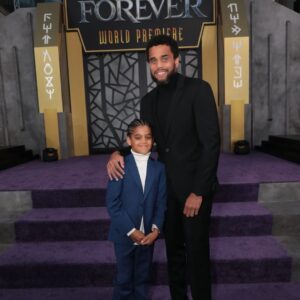 Michael Ealy Instagram - It's been our job as your parents to show you the world and all its possibilities. On this night, it was an honor to see you shine on your own! I thought i was just bringing you to the premiere of your first and favorite superhero. One that I didn't have nor could even dream of when I was your age. I thought that would be enough. My man! To be able to hold your hand throughout this experience was an honor son. In this very moment with my dear friend the incomparable @nischelleturner you, the little man that you're becoming, reached for me and said the most amazing words to her about me and my world stopped! ❤️ You never know what your kids think of you because at your age, you're kind of cagey about your feelings. So for you to open up the way you did meant so much to me. But what really affected me was the way you reached for me with so much pride. I'm so grateful that whoever took this shot caught this magical moment! THANK YOU! We have given you everything we have and we can't always tell what seeps in. However, on this night you revealed so much to me and mom with the most loving gesture and a few simple words that let me know where... where I stand with you. We love you. I love you. Keep shining young King. Boba got u.
#BlackPanther #WakandaForever 
PS... RUN don't walk to go see this movie!
