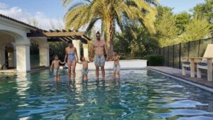 Michael Phelps Instagram - “Just one picture for Mommy’s Day please… Nevermind 😄 let’s just jump in together”
 I’m lucky to be a mommy to 3 amazing lil men 🧡💙💛