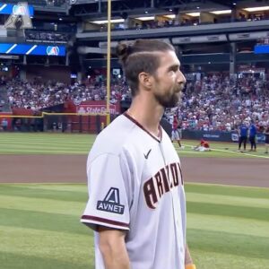 Michael Phelps Instagram - @m_phelps00 throwing out a first pitch in a way only Michael Phelps could.