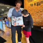 Mike O'Hearn Instagram - What an awesome week in California thanks to @goldsgymvenice1 for your hospitality I cannot describe the feeling looking through @schwarzenegger album with @mikeohearn Two gentlemen I’ve had the privilege of learning from. #greenrangerkyle #bodybuilding #bodybuilder #downsyndrome #downsyndromebodybuilder #emdstigma #fitness #motivation #fyp #fypシ #foryoupage #explorepage Golds Gym Venice Beach
