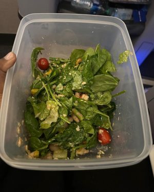 Mindy Kaling Instagram - I eat terribly when I travel and I wanted to change that. So instead of eating randomly (which lets face it is fun too, sometimes), I was like “what if I prepared my meal and brought it with me?”. Then I remembered this one time, maybe like 14 years ago, when I sat next to @jessicabiel on a flight. An hour in, she pulled out this container from her tote bag. It had the most delicious looking homemade salad in it that was definitely a better option than whatever I was eating. I always wanted to ask her what the recipe was! Anyway, my delicious plane salad recipe is:

-Cherry tomatoes, halved, sprinkled with salt + pepper 
-spinach, butter lettuce and romaine (whatever greens I had in the fridge), chopped up 
-a bunch of asparagus chopped and blanched for like 2 mins
-canned wild salmon in water, drained and flaked (I swear it doesn’t stink like tuna!!) 
-half a can of cannellini beans, rinsed and strained 
-a sprinkle of goat cheese 
-an easy dressing made of olive oil, momofuku seasoning salt, honey, salt, pepper, Dijon mustard

What’s your plane salad recipe? Or plane sandwich that doesn’t get soggy? Please share them below!