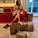 Mindy Kaling Instagram - The idea that I would not post my all-leopard outfit + leopard @dolcegabbana travel set is incomprehensible.