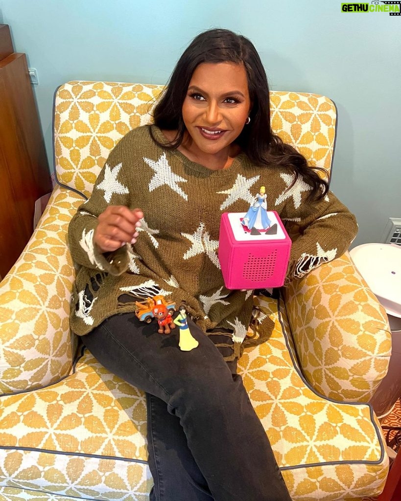 Mindy Kaling Instagram - I have a high bar for new toys in the house. For 1) I don’t want it to hurt when I step on it, which is many times a day. 2) I want it to be joyous for my kids and occupy them for hours so I can do work/send emails/watch my murder documentaries. That’s why I LOVE @tonies.us. There are no screens in sight. It's amazing to watch them discover their imaginations while playing with their favorite characters (literally, EVERY character you can imagine comes to life on this box). This year, @tonies.us is going with us everywhere, so I can confirm it's the perfect holiday gift for all the kiddos on your list. Available at @walmart and @target! #toniespartner