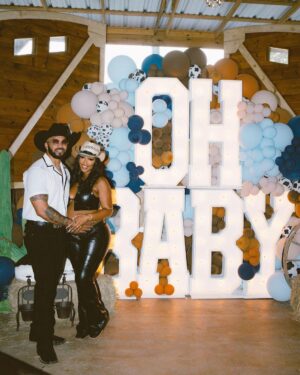 Miracle Watts Instagram - We celebrated our baby amongst a few close friends and family. Thank you every one for showing up for us. 

Decor : @overthetoppartyevents 
Bartender : @tasteamaizeng 
Sweets : @shalicioussweets 
Venue: @thebarnatfourpinesranch