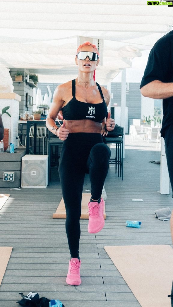Natalie Eva Marie Instagram - Discipline, consistency and dedication = success! 🎥 𝐅𝐔𝐋𝐋 𝐈𝐁𝐈𝐙𝐀 𝐖𝐎𝐑𝐊𝐎𝐔𝐓 𝐍𝐎𝐖 𝐋𝐈𝐕𝐄 𝐎𝐍 𝐌𝐘 𝐂𝐇𝐀𝐍𝐍𝐄𝐋 👆🏽 🙏🏽Honored to lead this amazing group of our @reignbodyfueleurope @reignbodyfuel grand prize winners in beautiful Ibiza 🏝through an intense workout this past week.🦾 - 💫Your body is unbelievable . I remember when I couldn’t do certain movements without my muscles shaking or feeling like they were going to fail. Now I can rep out those movements with ease. - 💫The human #body is amazing, a movement that was literally impossible for you to do, you can do a few weeks or months later with practice and #dedication. I believe that #fitness can teach you a lot of #life principles. - ✅#Challenge yourself physically every day, work towards something that seems like an impossible #goal. Sooner than you think you will attain that “impossible” goal. Get in the habit of doing this and watch how every other aspect of your life is #positively influenced💪🏼🙌🏼 - 💕PROUD OF THiS GROUP FOR GETTIN AFTER IT EARLY IN THE MORNING WHILE IN PARADISE 🦾🔥🥳 - Go GET SOME TODAY! - @monsterenergy #ImReadyToReign #Reign #MonsterEnergy #Workout #NEMFIT #NEMRecovery