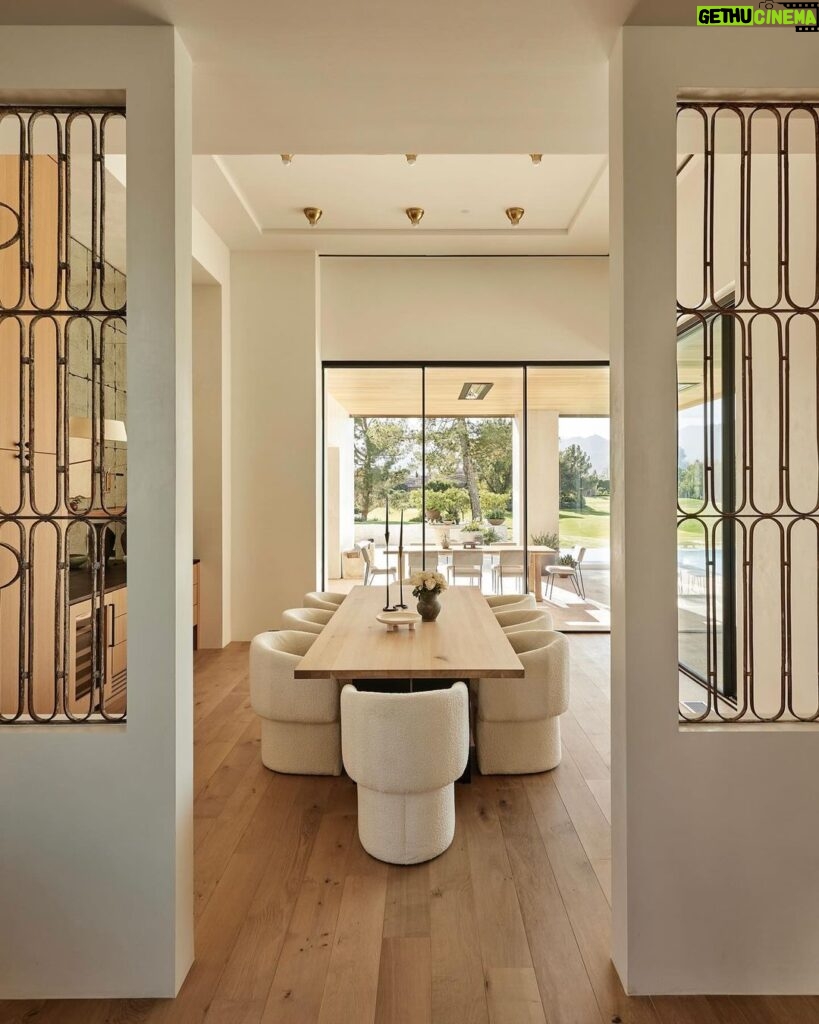 Nate Berkus Instagram - I fell in love with these 1930s French Art Deco garden gates in this desert project that we built into the walls, providing a window-like separation between the kitchen & dining room. It makes it feel like not everything in the house is brand new.