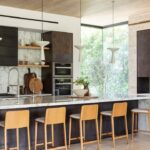 Nate Berkus Instagram - Mixing materials can be tricky (and intimidating). This modern kitchen we did for our #LosAngeles clients seamlessly blends wood, bronze, and stone. Pro tip: natural materials always complement each other.