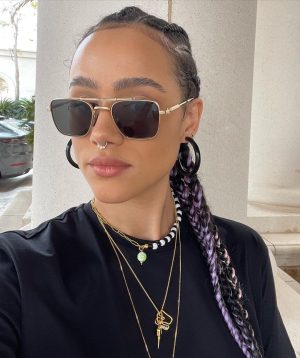 Nathalie Emmanuel Instagram - 🍓🍓🍓

My look for second day @mefcc in Abu Dhabi! 

Styling: @chercoulter
Jeans and bag: @jw_anderson
Tshirt: @sunspelclothing
Jewellery: @missoma, @mejuri and @mathe_jewelry 
Shoes: @aldo_shoes
Sunglasses: @akonieyewear
Nose ring: @laura_bond_jewellery