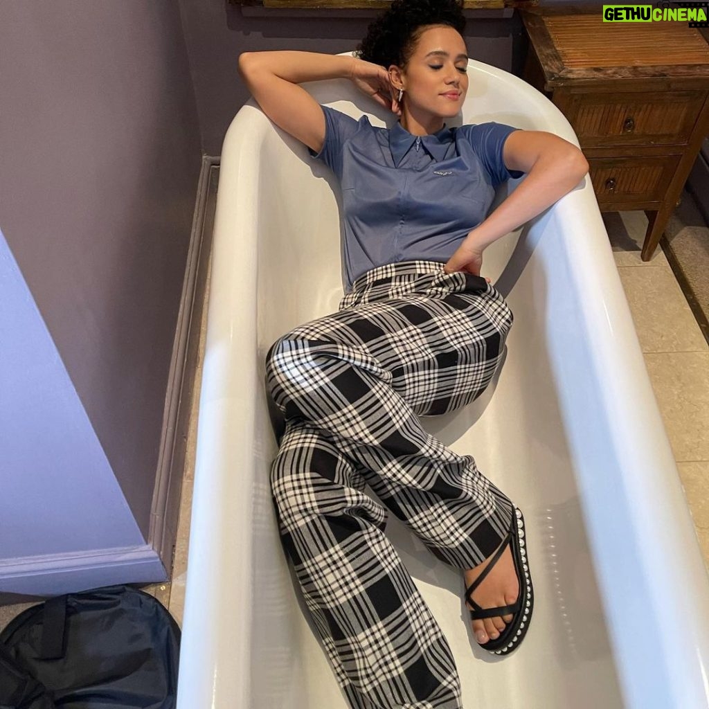 Nathalie Emmanuel Instagram - When bathtubs are your fave… did a fun panel with some badass ladies in this cute fit by @miumiu, shoes by @jimmychoo, styled by @chercoulter. Make up by @marcoantoniolondon Hair by @nickirwinhair The Portobello Hotel