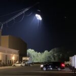 Nathan Fillion Instagram - I call this photo, “TDK by Moonlight on the Beach”. Only it’s not a beach, it’s a set. And it’s not the moon, it’s a giant light on the top of a crane. And I have no idea whether I’m wearing pants in this photo. #suicidesquad #jamesgunn #moviemoon #somethinginmyeye