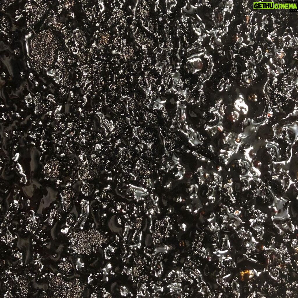 Neil deGrasse Tyson Instagram - What looks like a lava field is simply a close-up of food — I don’t remember what — left in a pan on the stove over low heat for way too long. The molecular chains that comprise what we eat, ultimately broke apart, exposing the black-carbon chemical foundations of all food, and of all life as we know it.