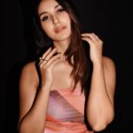 Nikita Dutta Instagram - 5 days away from the reveal 🧡🩷🤎 #Dange in theatres from 1st march 🔥 . . . . . Styled by @malvika_tater Assisted by @vrutiiiiiiii Dress @srstore09 Jewellery @shopalloya Shoes @monrowshoes Make up: @hairandmakeupbypinks Hair: @ishansupriyamilind 📸: @pehelaggarwal Managed by @janviiishettyyy