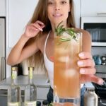 Nina Agdal Instagram - I’m so pumped for my Friendsgiving tomorrow night! I’ve teamed up with @BelvedereVodka and we’ve created such a delicious cocktail: low and behold The Holiday Honey 🍸🍯 😉. I made sure that it pairs perfectly with all of my favorite holiday staples because no Friendsgiving would be complete without a great drink to match the food. For all of my honeys who can’t be there, try the recipe out below and let me know what you think! #MadeWithNature #AD The Holiday Honey 1.5oz Belvedere Organic Infusions Pear and Ginger .75 oz Fresh Lemon Juice .5 oz Honey Water Pinch of Cinnamon 4 oz Ginger Beer Place all ingredients into a cocktail shaker except Ginger Beer and shake with ice. Pour into tall glass with fresh ice and top off with Ginger Beer. Garnish with Rosemary Sprig. ** Honey Water: 2 parts honey to 1 part warm water.
