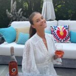 Nina Agdal Instagram – You guys know how much I love @kimcrawfordwine, so naturally I had to kick off the weekend with a glass 🍷. Have you tried their new Illuminate line? It’s SO good, and has a lower ABV content compared to classic Kim. It’s the perfect way to #KeepItLight on a Friday! 😍#kimcrawfordpartner
