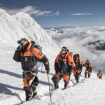 Nirmal Purja Instagram - BACK TO THE MOUNTAINS. My heart is still heavy from this last month. I am so proud of my @eliteexped team for the way they have pulled together to support each other, our clients and of course the families and friends of our beloved Anna and Mingmar. I am now in Kathmandu – still working hard, alongside all the team, families and all authorities involved to get all the correct permissions needed to bring the helicopter to Shishapangma Camp 2 to bring them home. It seems easy for a few people that have done a few 8000m summits on the fixed lines set by Nepalese climbers to become experts after these tragic events. But for me and my team, our experience is current, we live and breathe the mountains – it is my home for most of the year, no exped leader has as many successful 8000ers and climbs as I do. I would ask certain media to be respectful and remember that they are talking about four people that have lost their lives. It’s too easy for people to become “experts” after the event - but this is not right and it's not fair – you have to be there, involved and in the moment and you need to know all the details and the full scenario on the ground. Reflection should be for the greater good, not for toxic headlines. Be compassionate and take positive action rather than negativity. For us, we remain on standby for the helicopter mission, we hope for a positive resolution soon. Despite what the team have been through, we are looking forward – we know our loved ones would want us to. This week, we will welcome our Ama Dablam and @skydivenimsdai teams to Nepal. It seems strange to think about going back to the mountains again, however the mountains have always brought me peace and healing. And I have full faith in my team. They have proven themselves to be the best – kind, caring, resilient and knowledgeable. #OneMountainCommunity I am proud to be part of. Copyright Nimsdai #eliteexped #nimsdai #14peaks #AmaDablam @skydiveNimsdai #achieveyournewpossible #nothingisimpossible