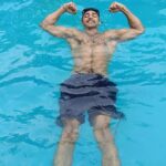 Nishant Singh Instagram – Floating through life with a smile, soaking up the sun and embracing every moment in the pool. Feeling grateful for this refreshing oasis and the journey that led me to this sculpted state of bliss. 🌞💦💪 
#PoolLife #SmileAndFloat #EmbraceTheJourney #nishantmalkani