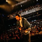 Noah Kahan Instagram - This UK/Europe run was the perfect reminder of what music is supposed to be about. A few hundred people in a room, joking around, singing together. Thanks for singing with me and for reminding me every day how fortunate I am to do this for a living. See you in February