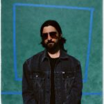 Noah Kahan Instagram - I had a great time at Boston Calling, so I'm excited to auction off this sick jacket in support of the @thebusyheadproject. Hit the link in my bio to bid, all proceeds go towards the PLUS1 x The Busyhead Project Fund & you could look as stylish as I do