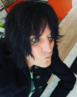Noel Fielding Instagram - Home alone doing a photo shoot for absolutely no one. Syd Barrett plays in the background Whilst Edward Gorey drifts around drinking herbal tea and stroking an invisible cat. x