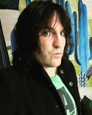 Noel Fielding Instagram - Home alone doing a photo shoot for absolutely no one. Syd Barrett plays in the background Whilst Edward Gorey drifts around drinking herbal tea and stroking an invisible cat. x