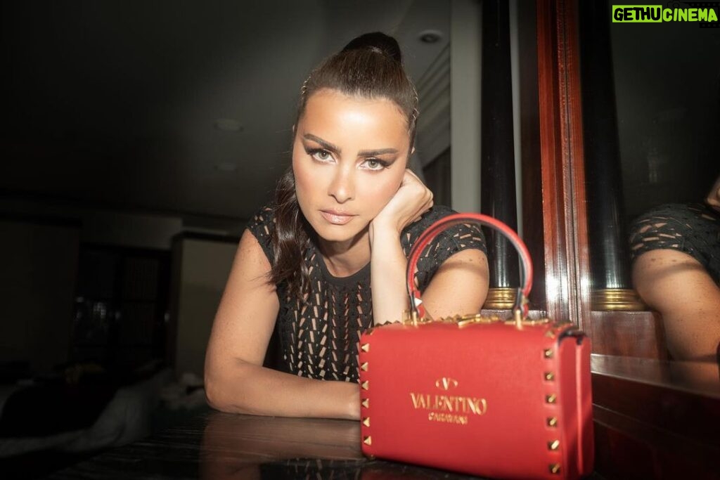 Nour Instagram - I’m ready for fall🧡 Full look: @maisonvalentino Photography: @christinesaliib Styled by: @yasmineeissa Makeup: @sharifftanyous Hair: @ahmed__mounir Location: @sofitelcairoeg #nour #valentinoromanpalazzo #rockstudalcove #valentinogaravaniboxbag @maisonvalentino #fall21