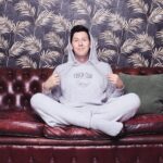 Phil Lester Instagram - 🍂Cosy season activated🛋 New merch the COUCH CLUB set is out now!! Ultimate fluffy comfortable loungewear perfect for a soft day chilling on the couch - featuring a cloud-like hoodie/bottoms set and super snuggly socks ☁️☁️☁️ Available now on my shop: amazingphilshop.com (worldwide) or us.amazingphilshop.com (USA) 📸 @lindablacker