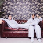 Phil Lester Instagram - 🍂Cosy season activated🛋 New merch the COUCH CLUB set is out now!! Ultimate fluffy comfortable loungewear perfect for a soft day chilling on the couch - featuring a cloud-like hoodie/bottoms set and super snuggly socks ☁️☁️☁️ Available now on my shop: amazingphilshop.com (worldwide) or us.amazingphilshop.com (USA) 📸 @lindablacker