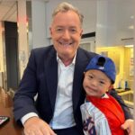 Piers Morgan Instagram – Meet my new buddy, Cooper Murray. He has Down’s syndrome and was found abandoned on a street corner in China in 2012 when he was just six months old. After a few years in an orphanage he was adopted by an American family, the Murrays, and is now travelling the US, throwing out the ceremonial first pitch at all 30 MLB stadiums to try and get other kids like him adopted from foster care. He’s such a nice young man, on a brilliant mission. As his parents said: ‘His journey is a testament to the power of opportunity, sometimes all a kid needs is a chance.’ Read up about him and his campaign here: teamcoop21 Manhattan, New York