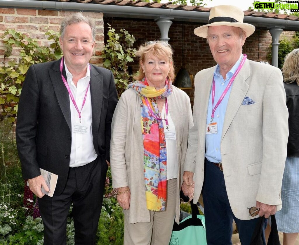 Piers Morgan Instagram - Such a treat being able to take my parents to the Chelsea Flower Show, especially in such glorious weather. The gardens were superb, many congrats to all the exhibitors and to all supported charities. Thanks also to @thenewtinsomerset for wonderful hospitality - much appreciated. PS The first pic of me and my Mum and Dad is by the great @richardyounggallery - one of the world’s best and most legendary photographers. Go check out his gallery. RHS Chelsea Flower Show, Royal Hospital Grounds, Chelsea