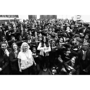 Prince Harry, Duke of Sussex Instagram - 50 years ago, women in Britain won the right to equal pay. That monumental moment began with one courageous and inspiring group of women in a factory in Dagenham, England. In 1968, facing a pay settlement that declared them less skilled than men, the sewing machinists of the Ford Motor Company walked out on strike.

In the face of great pressure, they stood firm, and two years later the UK Parliament was forced to pass the Equal Pay Act, protecting and supporting working women ever since.

To mark International Women’s Day, The Duchess of Sussex visited Dagenham to meet with Geraldine Dear, one of the strikers, and spend time with students at the Robert Clack Upper School to meet the town’s next generation of female role models, and talk to young women and men about the women who inspire them.
•
“Being in Dagenham is incredibly profound. Because as you can see with Geraldine and the other women who had the strength to really stand up for something that they knew needed to be done. This is the best example of no matter how small you might feel, how low you may feel on the ladder or the totem pole, no matter what colour you are, no matter what gender you are, you have a voice, and you certainly have the right to speak up for what is right.” - The Duchess of Sussex

A lifetime advocate and campaigner for gender equity, The Duchess joined a special assembly to celebrate this remarkable local story, as well as recognise the social, economic, cultural and political achievements of all women around the world.

#InternationalWomensDay #IWD2020 #EachForEqual

Photo © The Duke and Duchess of Sussex / Chris Allerton