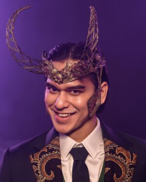 Rangga Azof Instagram - @azofrangga as TVA Loki

Special Fashion Collaboration 
inspired by Marvel Studios’ “Loki” with @rinaldyyunardi @riomotret @agusslim @erichalamin for @disneyplushotstarid. 

Recreating three looks from different variants of Loki with a touch of Indonesian culture. 

Marvel Studios’ “Loki” sudah bisa kamu streaming sekarang hanya di Disney+ Hotstar!

Photo by @riomotret @riomotretofficial
Wardrobe by @agusslim 
Headpiece by @rinaldyyunardi
Stylist by @erichalamin
Makeup by @bubahalfian
Hairdo by @rurypadwa
Nail Art by @linneabeautybar_id 

#DisneyPlusHotstarID #LOKI
#RIOMOTRET
#RIOMOTRET2021
#riocelebritybeautyportrait 
#IndonesiancelebritybyRIOMOTRET