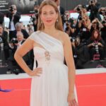 Raya Abirached Instagram - Dressed in white 🤍 for the back to back premieres of 2 very special movies, #Argentina1985 produced by my great friend @axelkuschevatzk & #Nezouh, starring the awesome @kindaalloush & @sameralmasri at the #VeniceFilmFestival @labiennale #StyledbyCed @cedrichaddad Jewellery: @bulgari Dress: @zuhairmuradofficial Make-up: @alessandranuovavia for @charlottetilbury , @charlottetilburyarabia Clutch & shoes @jimmychoo Photos @santinagargiulo Venice Film Festival