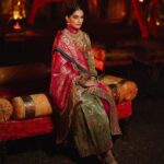 Rhea Kapoor Instagram – Since the night was dedicated to heritage ,Introducing the traditional attire of Ladakh: The Mogos, the primary garment, paired with the Bok cape for warmth, showcases the rich cultural tapestry influenced by the Silk Route. Crafted from silk by artisans of Benaras, this ensemble features intricate phoenix embroidery symbolizing energy and wisdom, with a crane motif representing peace and prosperity.

Also to carry on the theme of heritage I wore jewels from my  @kaveeta.singh @kapoor.sunita and @priya27ahuja  thank you all three for letting me raid your closets. Love you three the most. 

Outfit @namzacouture 
Bag custom @re_ceremonial
Juttis @5_elementsbyradhikagupta
Styling @rheakapoor and @manishamelwani 
Style team @sananver @junni.khyriem
Make up @makeupbyridhi
Hair  @komalvora_
photographer @josephradhik