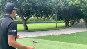 Rickie Fowler Instagram - How do you #PracticeWithPix ?? •

The first picture will give you a POV of where I am at set up...I can’t see my left eye or nose as they get covered up by the ball and putter head...my right eye is behind the putter and just under the line/just inside the middle of the ball •

Birdseye video will be a little distorted because of the angle not being from my eyes but gives you a rough idea if you were to imagine the ball being about 2 inches up on the black line...one of the things I focus on throughout the stroke is where I’m looking...I look at the ground behind the ball and don’t move my eyes until the ball has rolled a couple feet...one way I like to work on my eyes staying still is putting a dime behind the ball as if it was your ball marker...hit putts while keeping your eyes on the dime...this helps with releasing the putter naturally and not looking up toward the hole causing you to push/pull/guide it •

Face on...after checking things on the mirror it’s time to hit some putts without it...first when I come in to set up to a putt I always walk in and set the putter in first with my right hand (unless I’m working on something that is off) this helps promote a consistent set up...don’t dictate where the putter has to go let the putter dictate where you stand...second when the putter is swinging properly I like to see the butt of the grip point back in a very similar spot throughout the stroke which for me is just left of my bellybutton •

Down the line...you’ll see it’s a pretty relaxed position at set up...slight bend in the knees and even weight distribution...one thing I like to see here is a little bit of my left forearm vs being hidden by my right one and then the shaft and forearms being on the same plane •

The last couple videos it’s just fun to watch the @taylormadegolf #TP5pix roll...if the things above aren’t done properly the ball will give you quick feedback...how do you #PracticeWithPix ?
