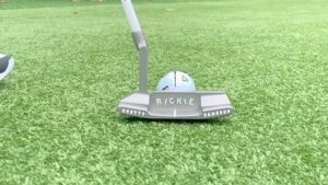 Rickie Fowler Instagram - How do you #PracticeWithPix ?? •

The first picture will give you a POV of where I am at set up...I can’t see my left eye or nose as they get covered up by the ball and putter head...my right eye is behind the putter and just under the line/just inside the middle of the ball •

Birdseye video will be a little distorted because of the angle not being from my eyes but gives you a rough idea if you were to imagine the ball being about 2 inches up on the black line...one of the things I focus on throughout the stroke is where I’m looking...I look at the ground behind the ball and don’t move my eyes until the ball has rolled a couple feet...one way I like to work on my eyes staying still is putting a dime behind the ball as if it was your ball marker...hit putts while keeping your eyes on the dime...this helps with releasing the putter naturally and not looking up toward the hole causing you to push/pull/guide it •

Face on...after checking things on the mirror it’s time to hit some putts without it...first when I come in to set up to a putt I always walk in and set the putter in first with my right hand (unless I’m working on something that is off) this helps promote a consistent set up...don’t dictate where the putter has to go let the putter dictate where you stand...second when the putter is swinging properly I like to see the butt of the grip point back in a very similar spot throughout the stroke which for me is just left of my bellybutton •

Down the line...you’ll see it’s a pretty relaxed position at set up...slight bend in the knees and even weight distribution...one thing I like to see here is a little bit of my left forearm vs being hidden by my right one and then the shaft and forearms being on the same plane •

The last couple videos it’s just fun to watch the @taylormadegolf #TP5pix roll...if the things above aren’t done properly the ball will give you quick feedback...how do you #PracticeWithPix ?