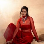 Roshini Haripriyan Instagram - Like a blazing ember, red whispers tales of ardor, courage, and the pulsating rhythm of life’s vibrant journey. ♥️ Photographer @photosbymandee Mua @noormakeup_mehndi Stying @joshua_maxwel1 Jewelry @jewelhub_chennai Makeup assist @jeni_mehandi_7 Photography Team @bharathi_saminathan @views.of.vasanth @manikanda.e #happynewyear #roshniharipriyan