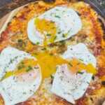 Ryan Seacrest Instagram - One of my favorites - runny egg on pizza 🍕 🍳 #gameday